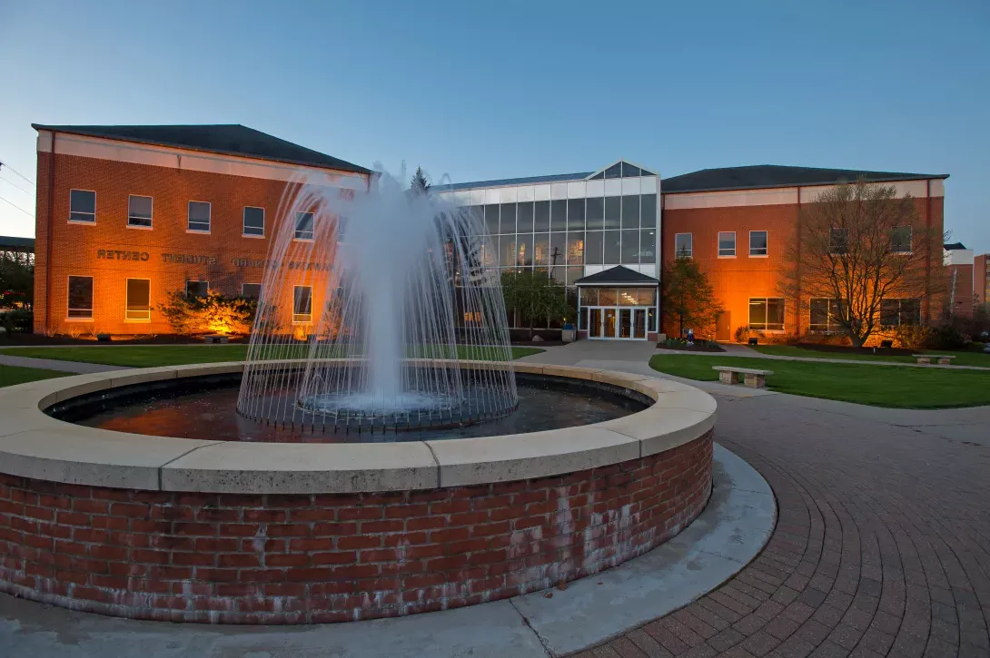 Fountain in front of the Hawkins-Conard Student Center at night